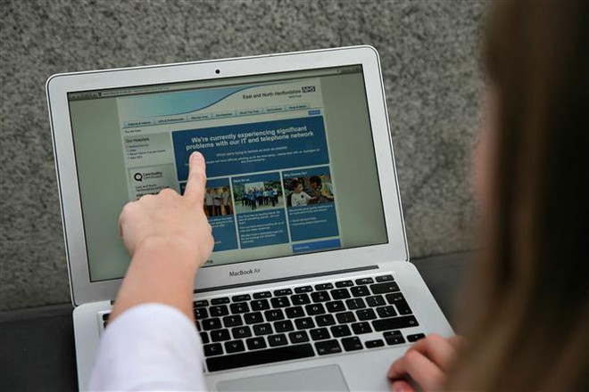 Một trang web bị tin tặc tấn công. (Ảnh minh họa. AFP/TTXVN) Số vụ tội phạm mạng tại Nhật Bản lên mức cao nhất từ trước tới nay ảnh 1