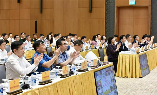 Các đại biểu dự Hội nghị Thường trực Chính phủ làm việc với các doanh nghiệp nhà nước. (Ảnh: Dương Giang/TTXVN) Tháo gỡ khó khăn, thúc đẩy sản xuất của doanh nghiệp Nhà nước ảnh 2