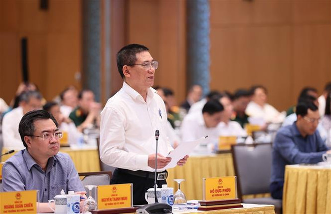 Bộ trưởng Bộ Tài chính Hồ Đức Phớc phát biểu. (Ảnh: Dương Giang/TTXVN) Tháo gỡ khó khăn, thúc đẩy sản xuất của doanh nghiệp Nhà nước ảnh 3
