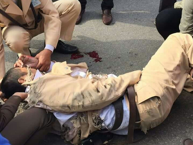 Tài xế xe kéo lê cảnh sát giao thông hàng chục mét đã ra đầu thú ảnh 1