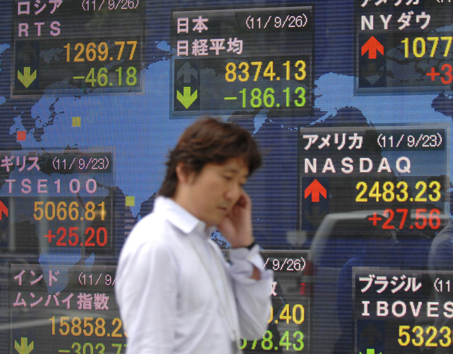 Sắc xanh đỏ đan xen trên các thị trường chứng khoán châu Á ảnh 1