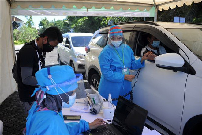 Indonesia kéo dài hạn chế xã hội, cho phép thai phụ tiêm vaccine ảnh 2