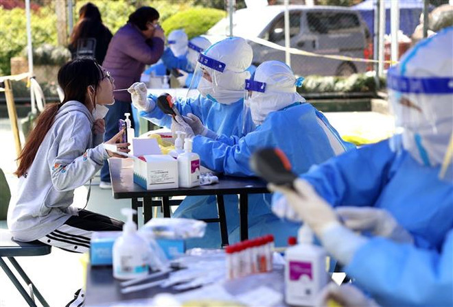 Trung Quốc đại lục ghi nhận hơn 25.000 ca mắc COVID-19 mới ảnh 1