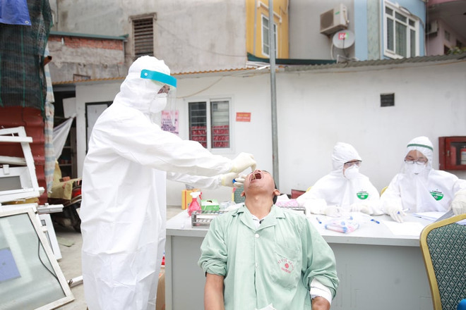 Hà Nội xác định xong các ca F1, F2, quyết liệt dập dịch tại Hạ Lôi ảnh 2