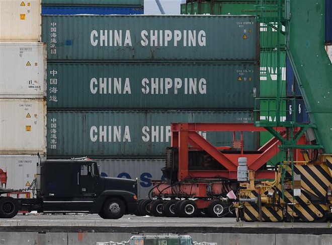 Hàng hóa Trung Quốc xếp tại cảng Long Beach ở California, Mỹ. (Ảnh: AFP/TTXVN) Trung Quốc là đối tác thương mại hàng đầu của Đức 5 năm liên tiếp ảnh 1