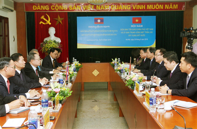 Việt Nam-Lào trao đổi kinh nghiệm quản lý nhà nước về tôn giáo ảnh 2