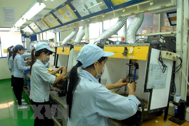 Một doanh nghiệp đang hoạt động tại Khu công nghiệp Bình Xuyên. (Ảnh: Danh Lam/TTXVN) Tỉnh Vĩnh Phúc phê duyệt đề án thu hút các nhà đầu tư chiến lược ảnh 1