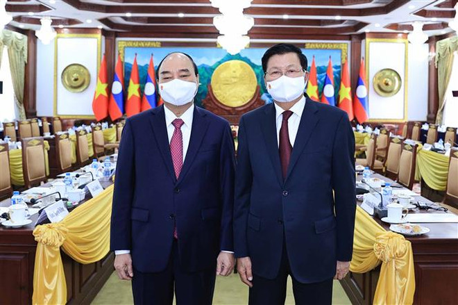 Chủ tịch nước kết thúc tốt đẹp chuyến thăm hữu nghị chính thức Lào ảnh 1