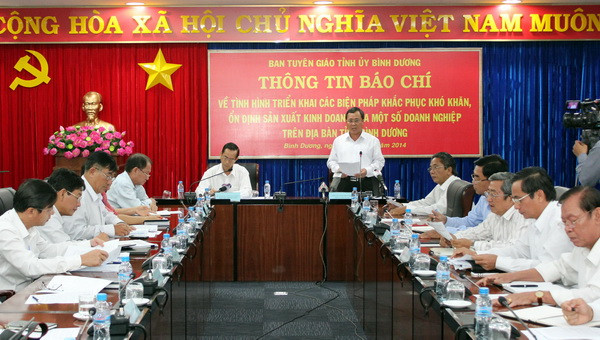 Bình Dương triển khai các biện pháp ổn định sản suất cho doanh nghiệp nước ngoài.(Ảnh: Quách Lắm/TTXVN) Các doanh nghiệp tại nhiều tỉnh trở lại làm việc bình thường ảnh 1