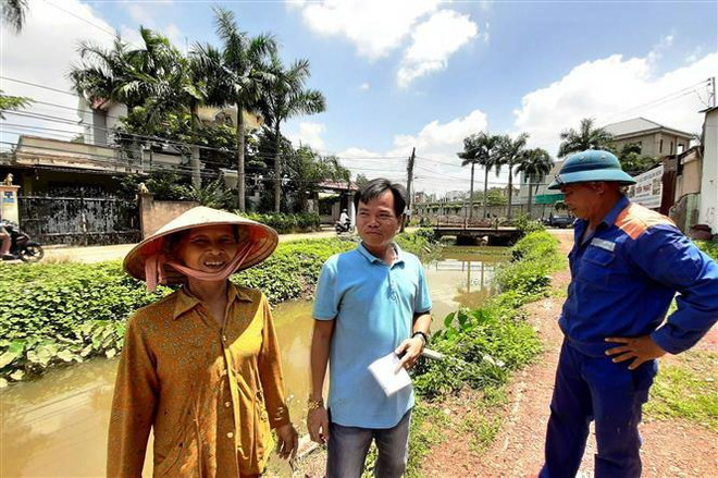 Người phụ nữ Đồng Xoài tự nguyện hiến đất để hồi sinh con suối “chết” ảnh 1