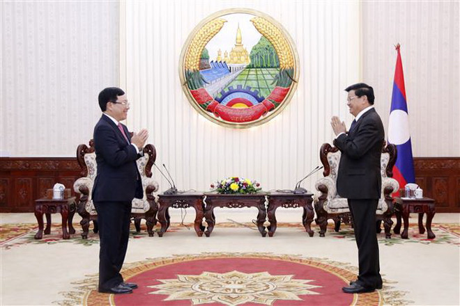 Việt-Lào cần chia sẻ kinh nghiệm trong công tác chuẩn bị đại hội Đảng ảnh 1