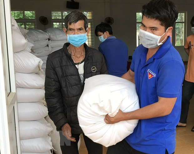 Xuất cấp gạo cho người dân. (Ảnh minh họa. Nguồn: TTXVN) Xuất gạo từ nguồn dự trữ quốc gia hỗ trợ người dân 9 tỉnh ảnh 1