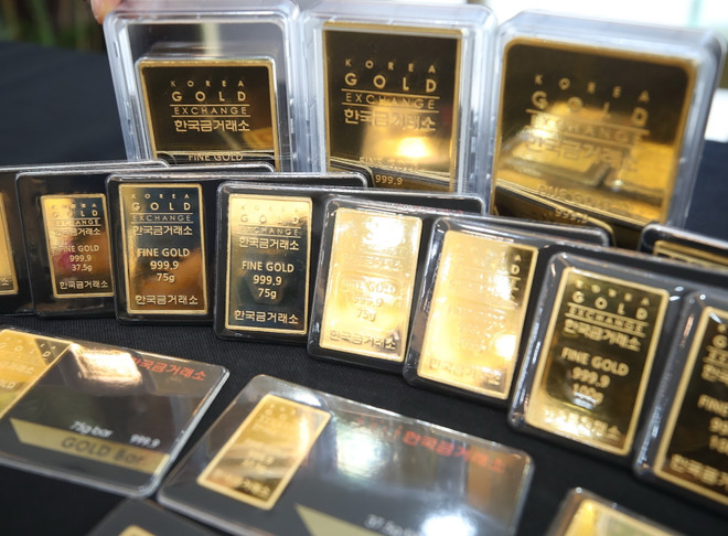 Giá vàng thế giới tuần qua giảm 1% do đồng USD mạnh lên ảnh 1