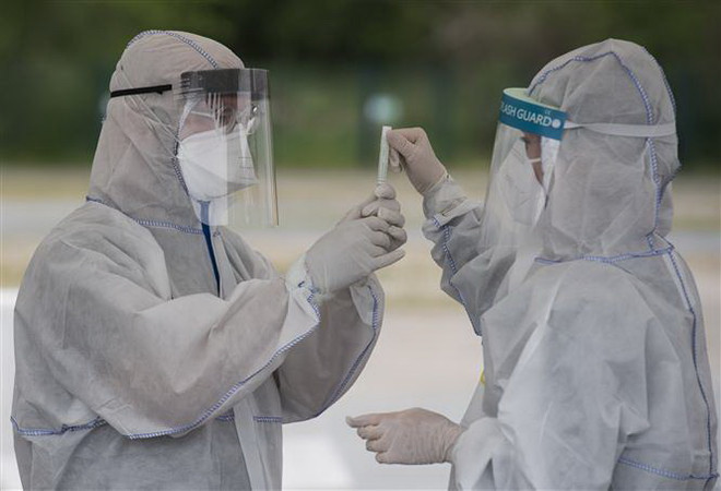 Cộng đồng người Việt quyên tặng 100.000 khẩu trang cho 16 bang của Đức ảnh 2