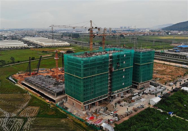 Quy mô Dự án nhà ở xã hội Evergreen Bắc Giang gồm: 10 tòa chung cư, 20 tầng nổi và 1 tầng hầm. (Ảnh: Danh Lam/TTXVN) Bộ Xây dựng thông tin về việc triển khai gói tín dụng 120.000 tỷ đồng ảnh 1