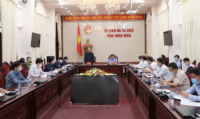 Quang cảnh buổi làm việc. (Ảnh: Đức Phương/TTXVN) Đẩy nhanh giải phóng mặt bằng dự án cao tốc Bắc-Nam phía Đông ảnh 1