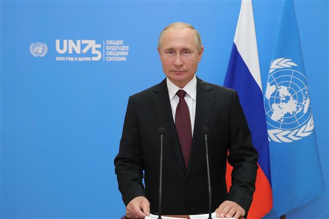 Tổng thống Nga Vladimir Putin. (Ảnh: AFP/TTXVN) Tổng thống Nga khẳng định cuộc chiến với đại dịch còn lâu mới kết thúc ảnh 1