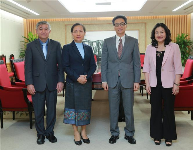 Việt Nam-Lào chia sẻ kinh nghiệm, hỗ trợ nhau về vấn đề an sinh xã hội ảnh 2