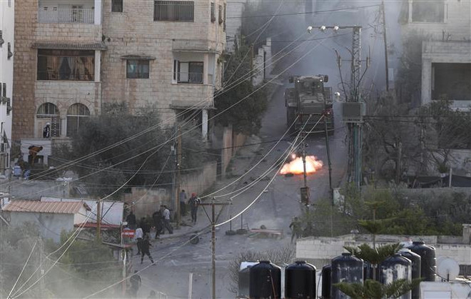 Giao tranh giữa quân đội Israel và tay súng Palestine ở khu Bờ Tây ảnh 1