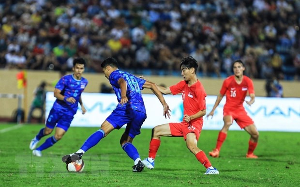 Báo chí Thái Lan ấn tượng về sự cuồng nhiệt của cổ động viên Việt Nam ảnh 1