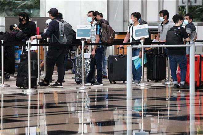 Singapore áp dụng biện pháp bảo đảm hạn chế tiếp xúc tại sân bay ảnh 1