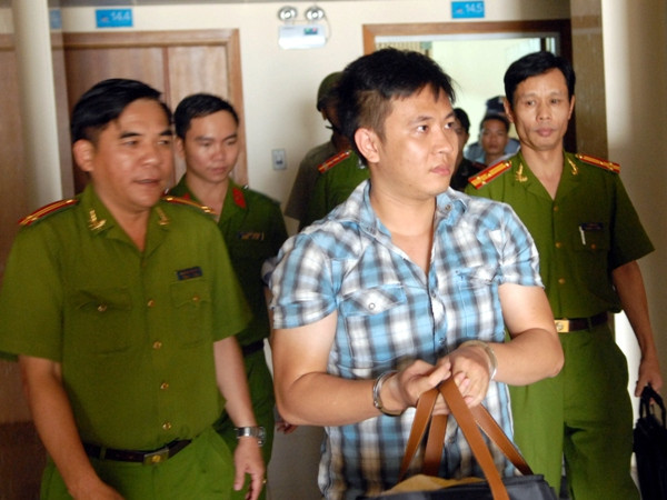 Bắt khẩn cấp một đối tượng tội phạm công nghệ cao tại Thành phố Hồ Chí Minh. (Ảnh: TTXVN) Tình hình tội phạm trên địa bàn Hà Nội còn diễn biến phức tạp ảnh 1