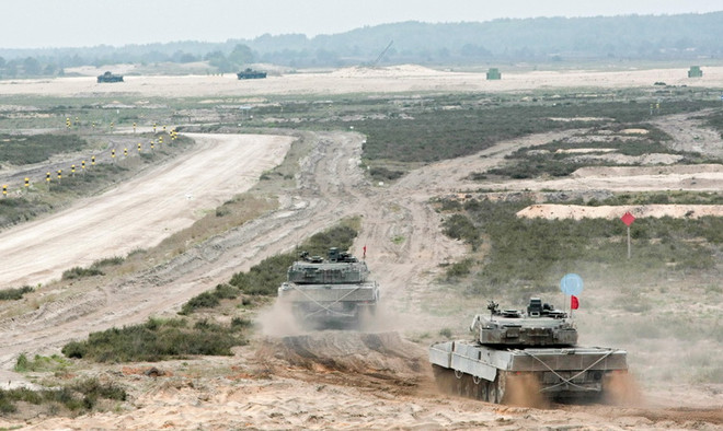 Anh và Canada tăng cường hợp tác quân sự tại khu vực Đông Âu ảnh 1