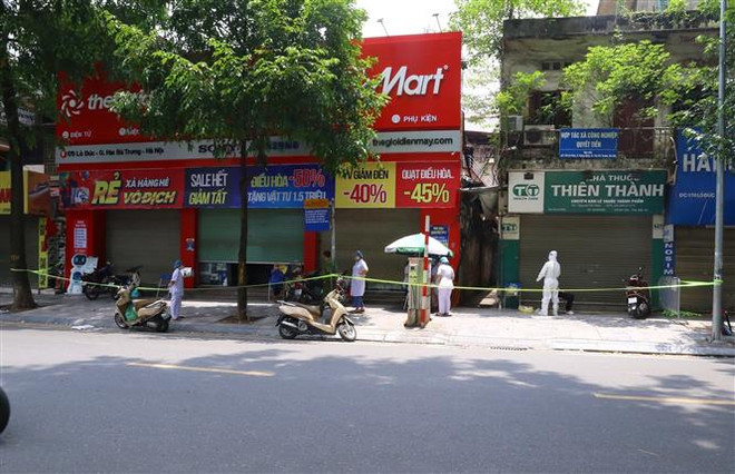 Khu vực ngõ 172 Lò Đúc, Hà Nội bị phong tỏa. (Ảnh: Hoàng Hiếu/TTXVN) Sáng 25/7: 3.979 ca mắc mới, hơn 4,5 triệu liều vaccine đã được tiêm ảnh 1