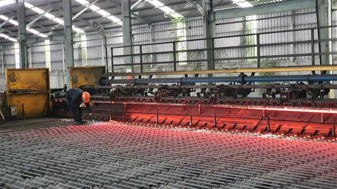 Kim ngạch thương mại Việt Nam-Lào tiếp tục tăng trong năm 2022 ảnh 1