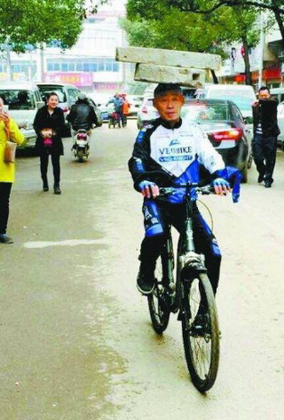 (Nguồn: shanghaiist.com) Đội ximăng tập thể dục, người đàn ông Trung Quốc giảm 30kg ảnh 4