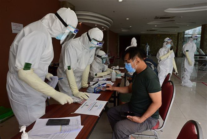 Số ca nhiễm tại Indonesia giảm, Malaysia áp đặt hạn chế tại điểm nóng ảnh 1