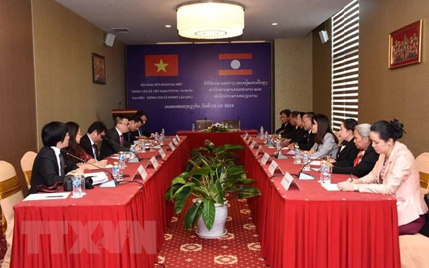 Quang cảnh buổi hội đàm giữa Đoàn đại biểu Thông tấn xã Việt Nam và Đoàn đại biểu Thông tấn xã Pathet Lào. (Ảnh: Phạm Kiên/TTXVN) Quan hệ hợp tác giữa Thông tấn xã Việt Nam và KPL ngày càng bền chặt ảnh 1