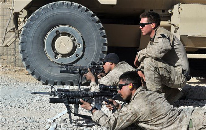 Binh sỹ Mỹ khi còn ở căn cứ quân sự ở tỉnh Helmand, Afghanistan. (Ảnh: AFP/TTXVN) Lầu Năm Góc thông báo tiến độ rút quân khỏi Afghanistan ảnh 1
