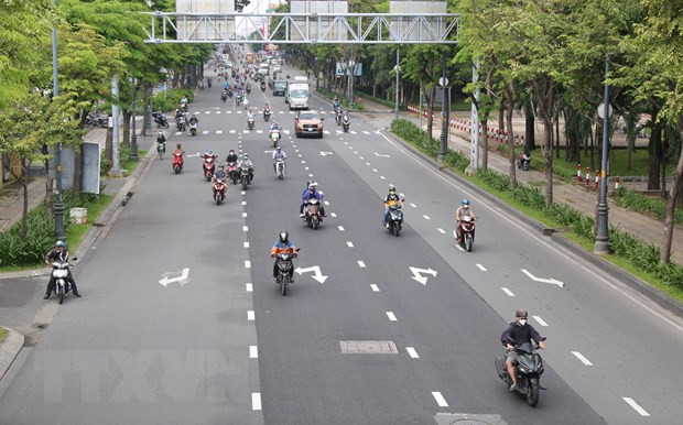 Đường phố ở Thành phố Hồ Chí Minh. (Ảnh: Xuân Tình/TTXVN) Thành phố Hồ Chí Minh vượt qua đại dịch, vững tin phát triển bền vững ảnh 1