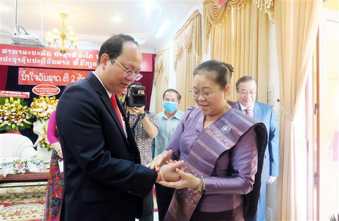 Lãnh đạo TP Hồ Chí Minh chúc mừng tết cổ truyền Bunpimay của Lào ảnh 2