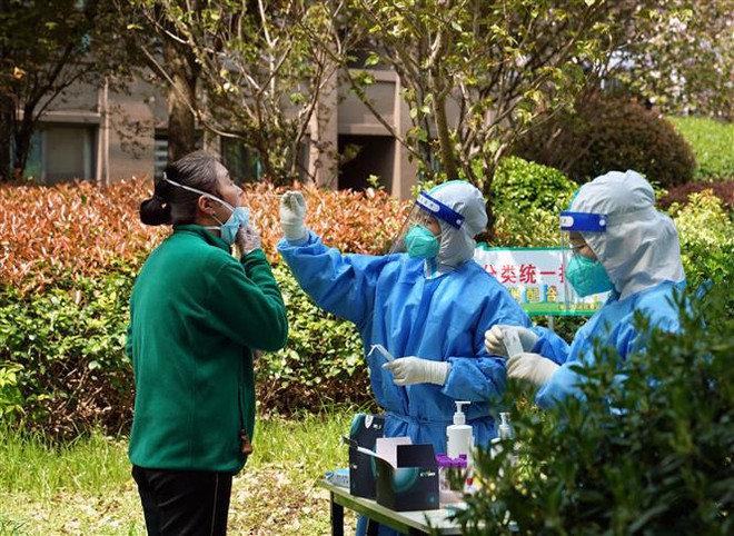 Trung Quốc: Thành phố Quảng Châu siết chặt công tác chống COVID-19 ảnh 1