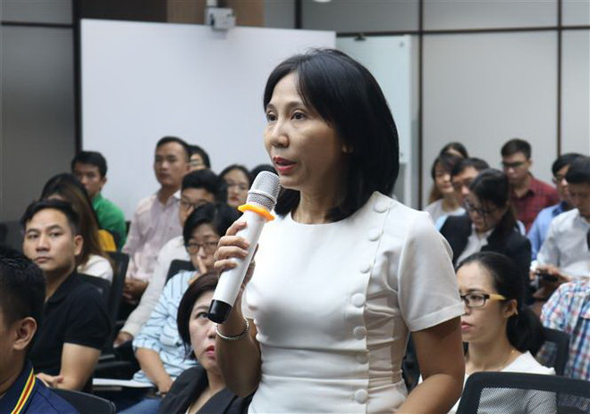 Doanh nghiệp đặt câu hỏi về thông tin thị trường Hoa Kỳ tại Hội thảo. (Ảnh: Xuân Anh/TTXVN) Tận dụng thương mại điện tử để khai thác hiệu quả thị trường Hoa Kỳ ảnh 3