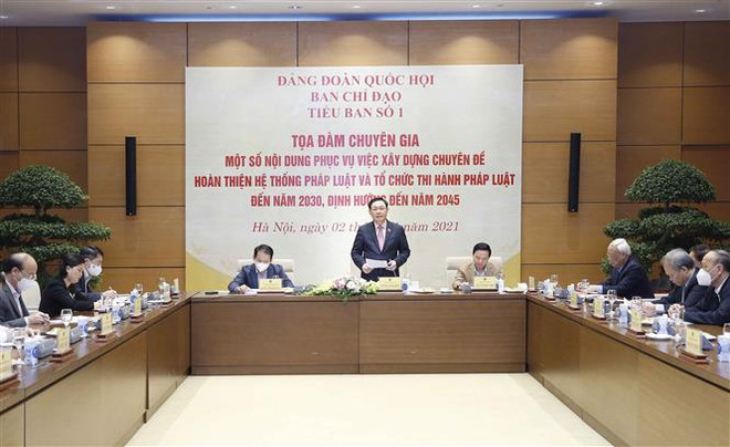 Chủ tịch Quốc hội chủ trì tọa đàm về xây dựng hệ thống pháp luật ảnh 1