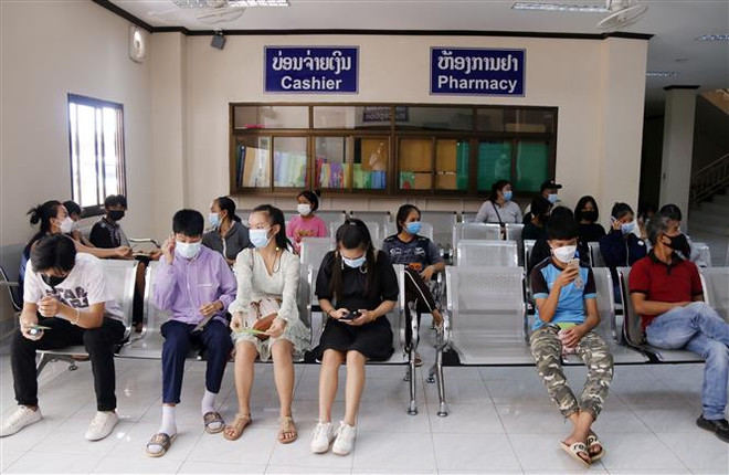 Số ca mắc mới COVID-19 tại Lào giảm mạnh nhưng vẫn ở mức 4 con số ảnh 1