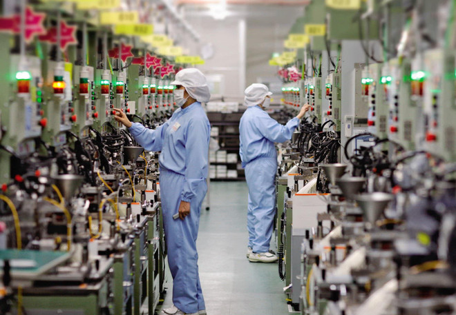 Một dây chuyền sản xuất tại Nhật Bản. (Nguồn: asia.nikkei.com) Nhật Bản cân nhắc thắt chặt kiểm soát xuất khẩu công nghệ tiên tiến ảnh 1