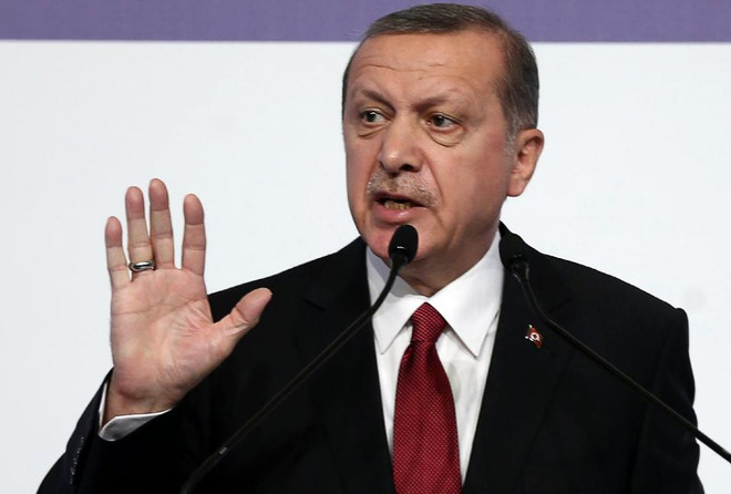 Tổng thống Recep Tayyip Erdogan. (Nguồn: AFP) Mỹ, Thổ Nhĩ Kỳ giảm căng thẳng sau vụ bắn rơi máy bay Nga ảnh 1