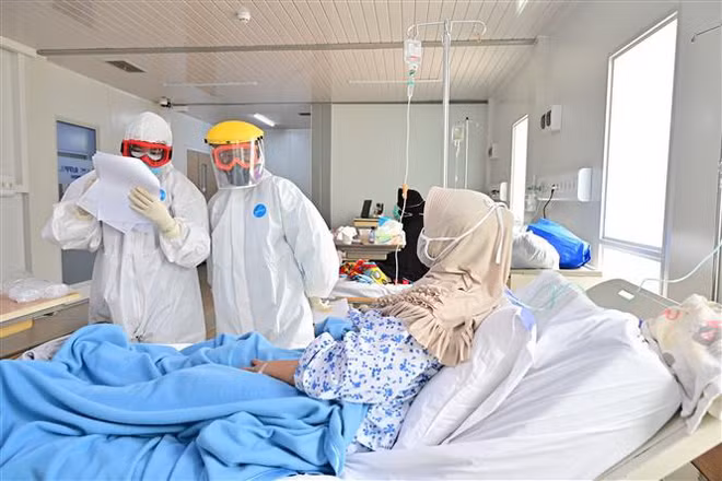 Giới chuyên gia: COVID-19 không thể kết thúc trong 6 tháng tới ảnh 2