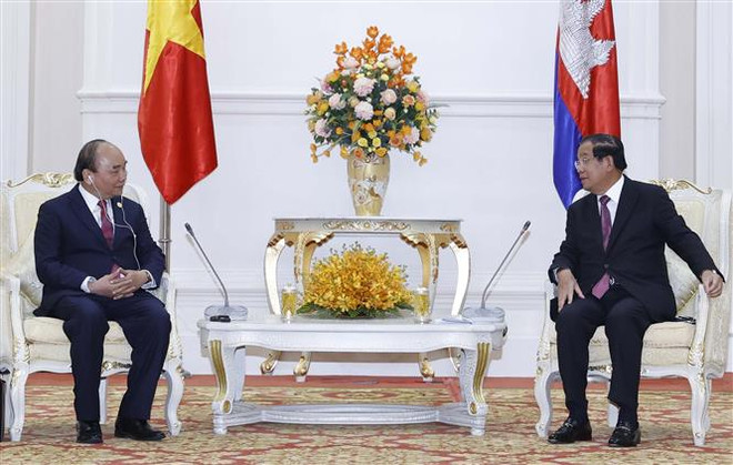 Chủ tịch nước Nguyễn Xuân Phúc gặp Thủ tướng Campuchia Samdech Techo Hun Sen. (Ảnh: Thống Nhất/TTXVN) Việt Nam-Campuchia thống nhất cao về phương hướng thúc đẩy quan hệ ảnh 2