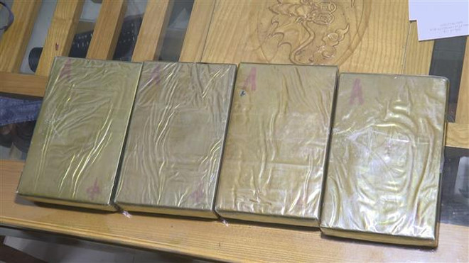 Lào Cai bắt giữ 3 đối tượng vận chuyển trái phép 22 bánh heroin ảnh 1