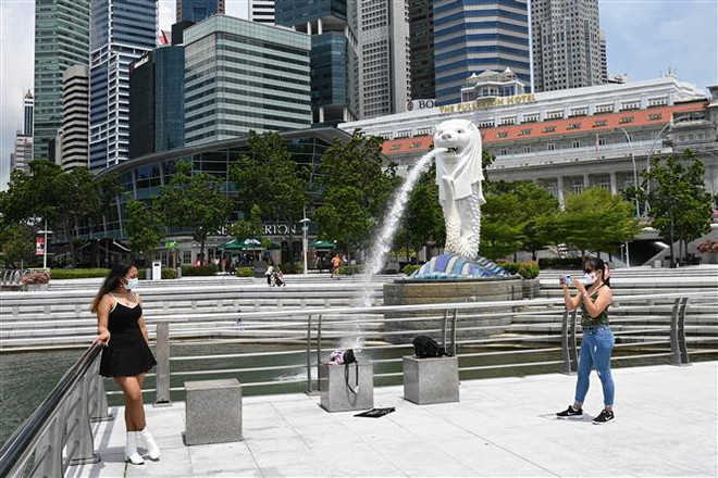 Số ca mắc mới tại Singapore đã quay trở lại ngưỡng trên 10.000 ảnh 1