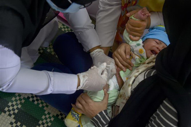 Dịch bệnh COVID-19 đang gây ra cuộc khủng hoảng y tế mới ảnh 2