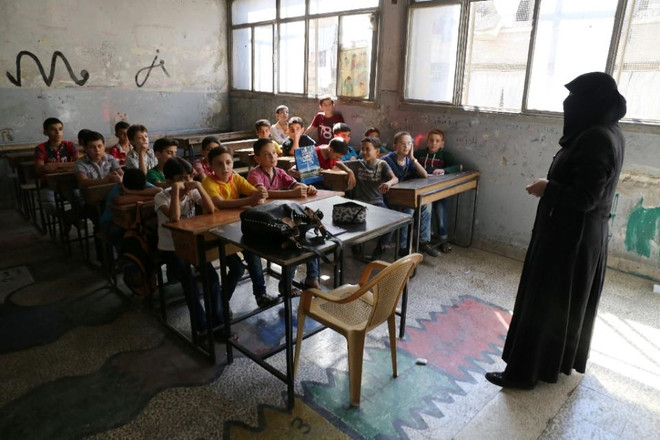 Syria: Người dân Aleppo khốn đốn trong vòng kìm kẹp của IS ảnh 2