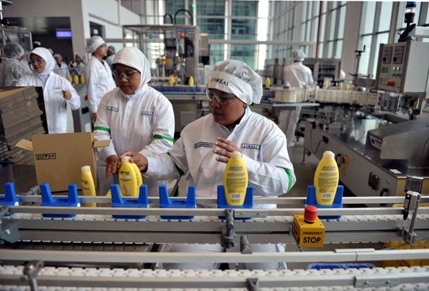 Ảnh minh họa. (Nguồn: AFP) Đà phục hồi thương mại của ASEAN có thể bị tác động bởi Omicron ảnh 2