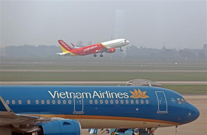 (Ảnh: Huy Hùng/TTXVN) Chuyên gia đưa ra những lý do khiến giá vé máy bay bị đẩy lên cao ảnh 1