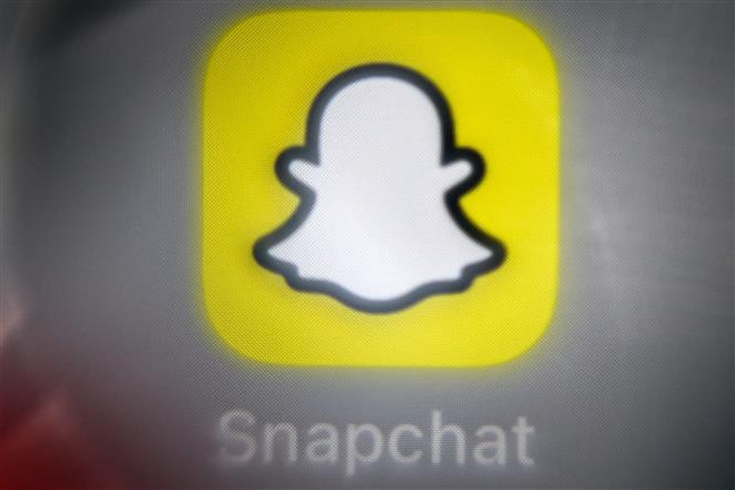 Biểu tượng mạng xã hội Snapchat. (Ảnh: AFP/TTXVN) Snapchat mở quyền truy cập chatbot tùy biến My AI cho người dùng ảnh 1